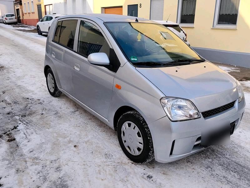Gebraucht Daihatsu Cuore 61 PS (44 kW) 2005 Silber Kleinwagen