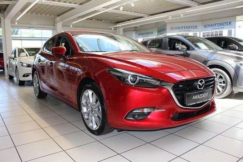 Rubinrot (metallic) Gebraucht 2018 Mazda 3 Sports-Line Limousine | 16.990 € (Fairer Preis) - Bild 1/4