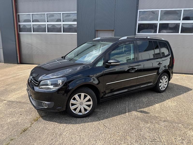 Schwarz Gebraucht 2010 VW Touran Van / Kleinbus | 8.499 € (Fairer Preis) - Bild 1/4