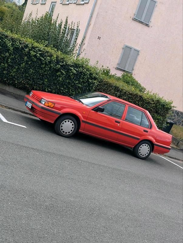 Gebraucht Nissan Sunny 73 PS (53 kW) 1988 Rot Limousine