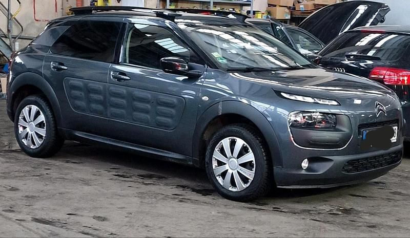 Grau Gebraucht 2015 Citroën C4 SUV | 8.950 € (Fairer Preis) - Bild 1/4