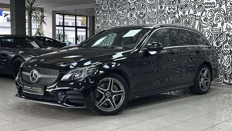 Obsidianschwarz metallic Gebraucht 2018 Mercedes C400 AMG Kombi | 32.770 € (Etwas zu teuer) - Bild 1/3