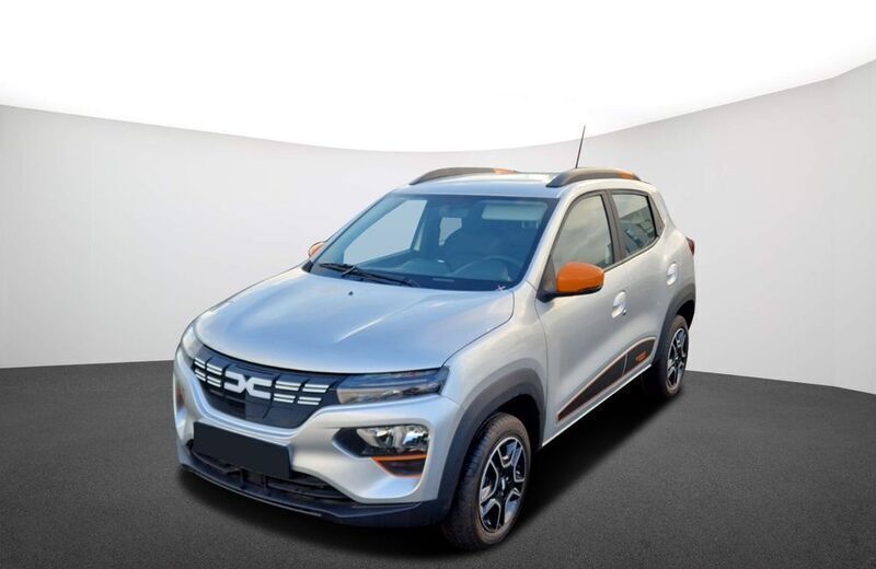 Silbergrau metallic (metallic) Gebraucht 2023 Dacia Spring Essentiel Kleinwagen | 15.390 € (Teuer) - Bild 1/4