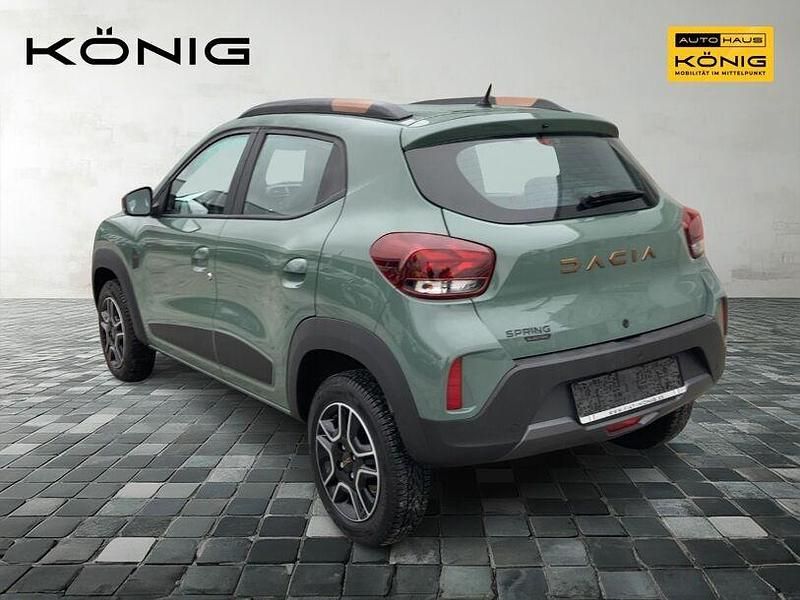 Gebraucht Dacia Spring Extreme 47 kW (65 PS) 2023 Olivgrün Kleinwagen