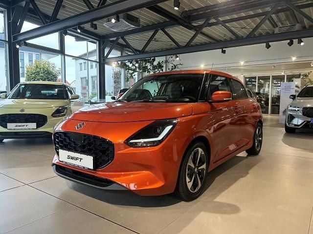 Orange Neu 2025 Suzuki Swift Comfort+ Kleinwagen | 21.990 € - Bild 1/4