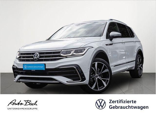 Weiß (pure white) Gebraucht 2022 VW Tiguan Allspace R-line SUV | 40.440 € (Fairer Preis) - Bild 1/4