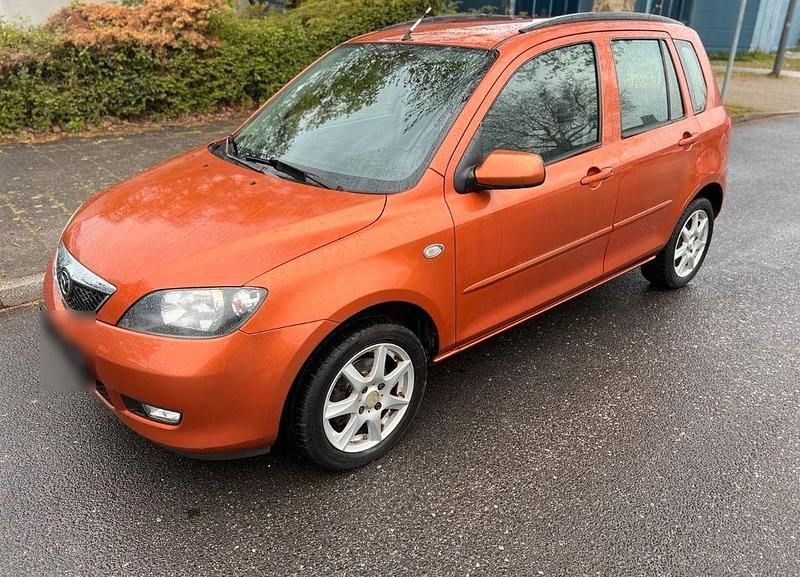 Second-hand Mazda 2 80 CP (58 kW) 2003 Portocaliu Hatchback