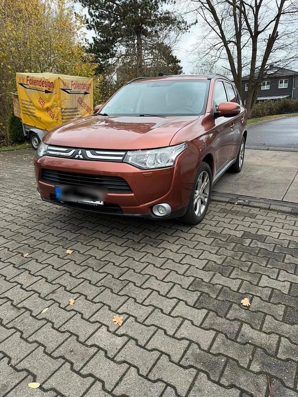 Orange Gebraucht 2012 Mitsubishi Outlander SUV | 7.500 € - Bild 1/4