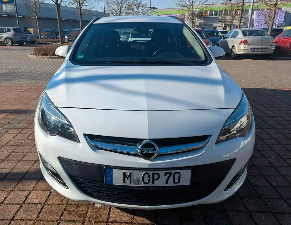 Używany Opel Astra 136 KM (100 kW) 2016 Biały Kombi
