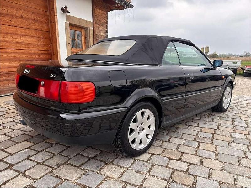 Gebraucht Audi Cabriolet 125 PS (91 kW) 1999 Brillantschwarz mit klarlack Cabrio