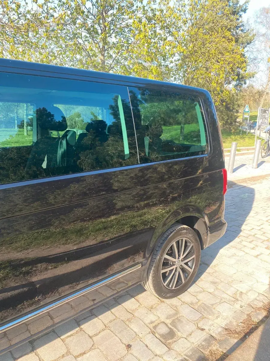 Używany VW T5 102 KM (75 kW) 2011 Czarny Van