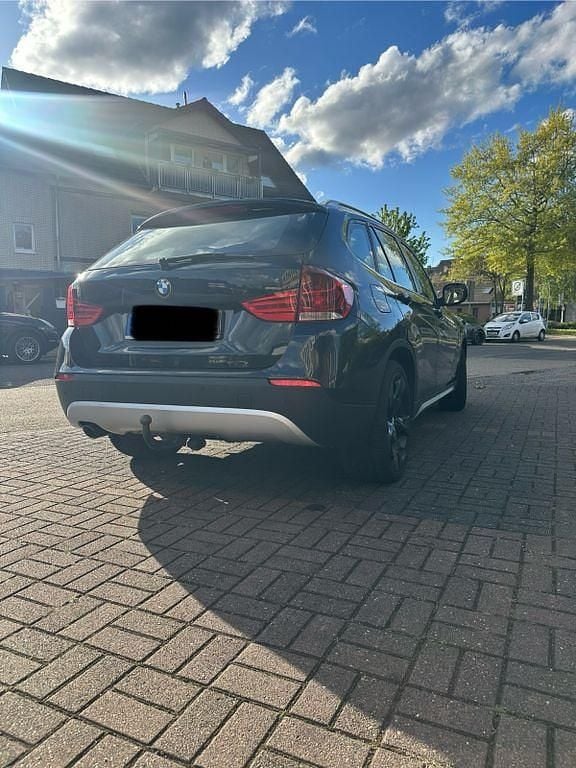 Second-hand BMW X1 204 CP (150 kW) 2009 Negru SUV