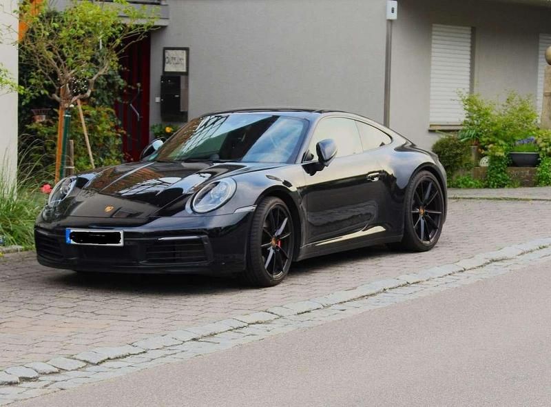 Schwarz Gebraucht 2024 Porsche 911 Carrera S Coupé | 126.000 € (Superpreis) - Bild 1/4