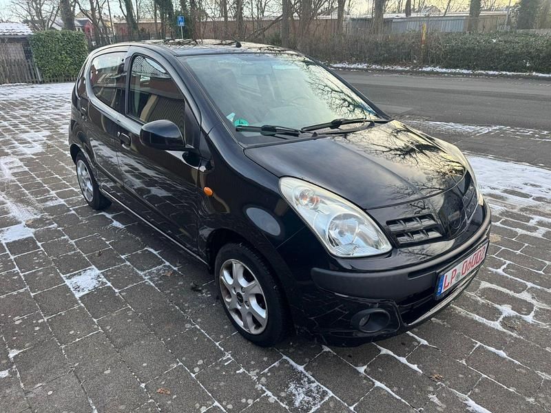 Gebraucht Nissan Pixo 68 PS (50 kW) 2010 Schwarz Kleinwagen