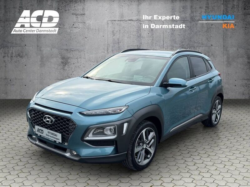 Ceramic blue metallic (metallic) Gebraucht 2020 Hyundai Kona Premium SUV | 18.470 € (Fairer Preis) - Bild 1/4