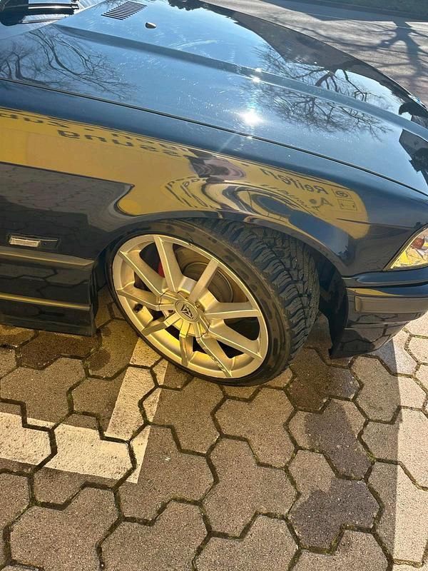 Gebraucht BMW 318 Cabriolet 118 PS (86 kW) 1995 Schwarz Cabrio