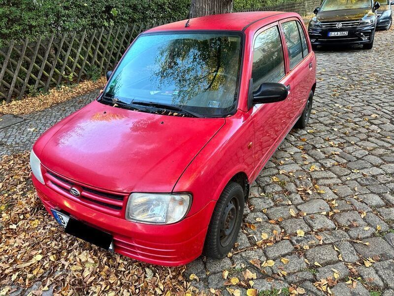 Gebraucht Daihatsu Cuore 56 PS (41 kW) 1999 Rot Kleinwagen