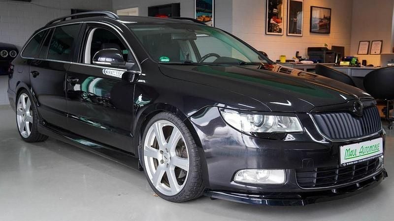 Gebraucht Skoda Superb Exclusive 140 PS (102 kW) 2013 Cerna magic/black magic Kombi