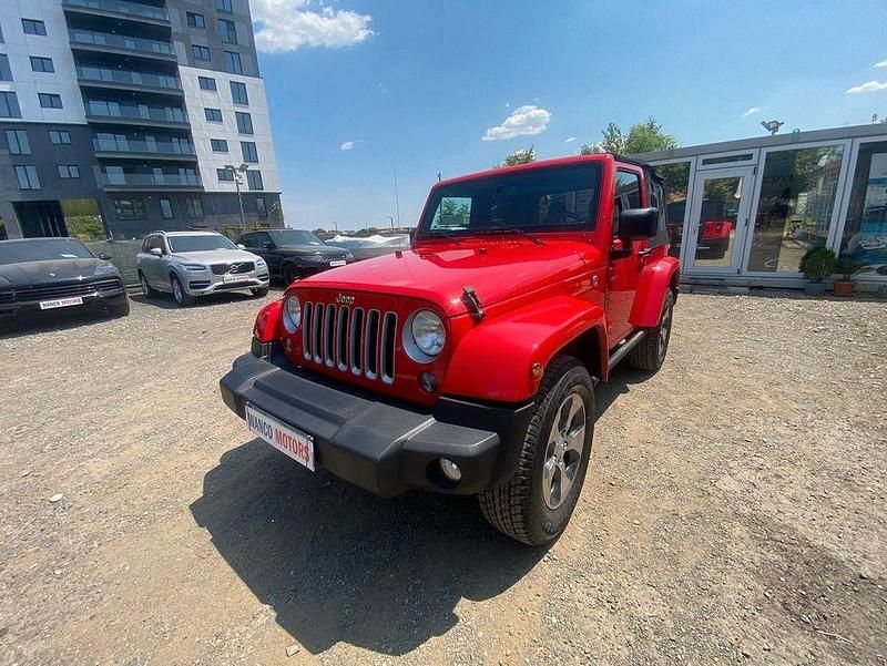 Rot Gebraucht 2017 Jeep Wrangler Unlimited Sahara SUV | 34.900 € (Superpreis) - Bild 1/4