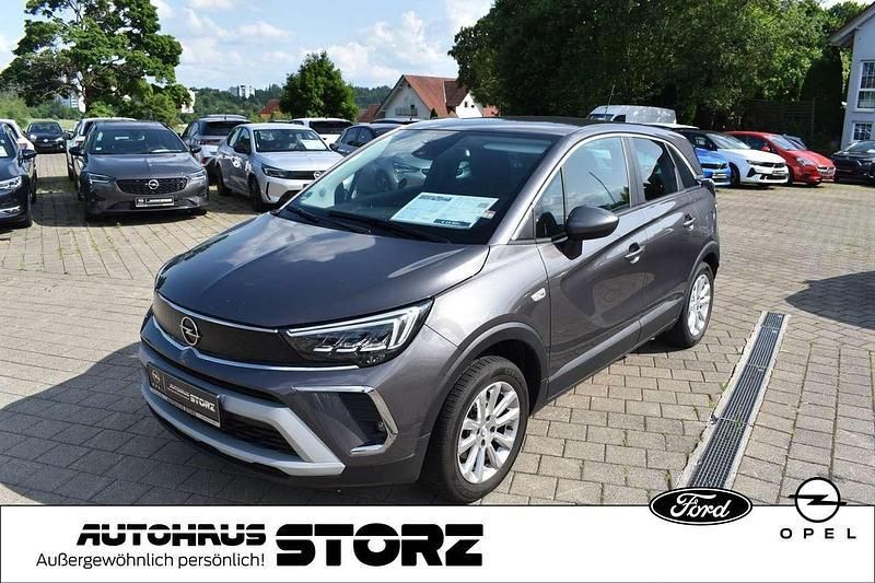 Mondstein grau/e:vulkan grau Gebraucht 2021 Opel Crossland Elegance SUV | 19.900 € (Fairer Preis) - Bild 1/2