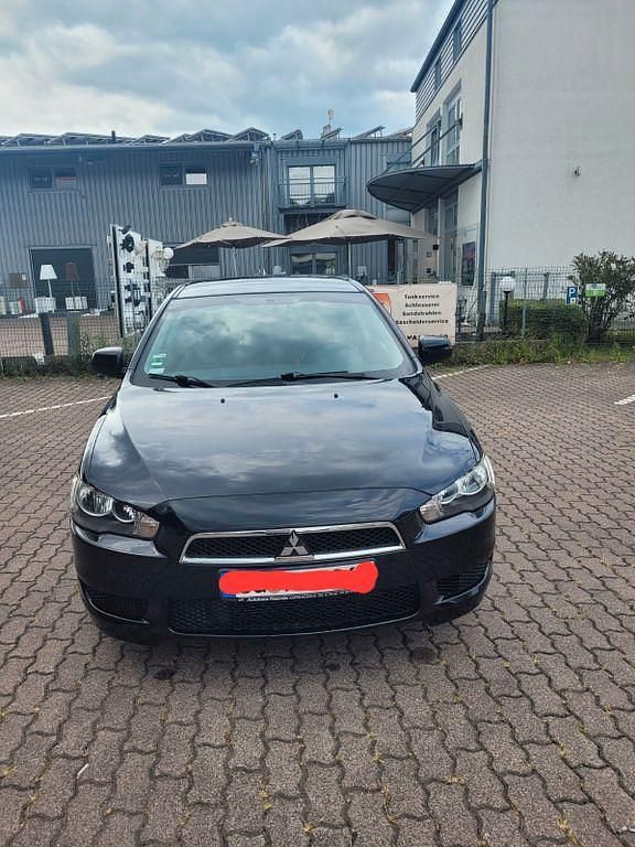 Schwarz Gebraucht 2009 Mitsubishi Lancer Limousine | 4.700 € (Fairer Preis) - Bild 1/4