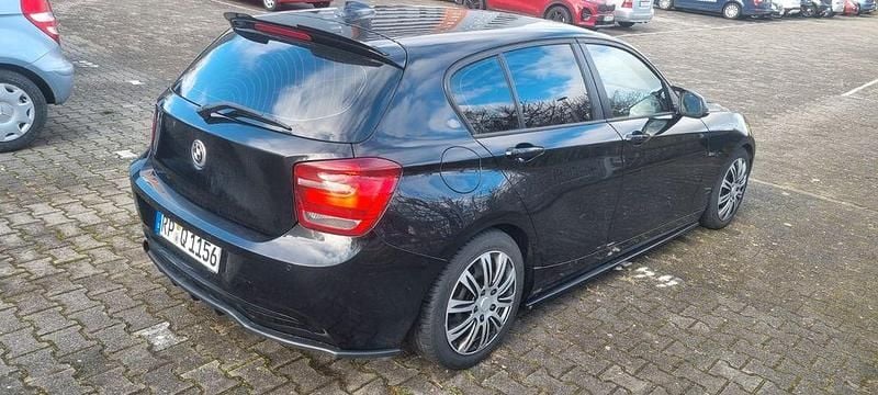 Gebraucht BMW 118 Sport Line 170 PS (125 kW) 2012 Schwarz Kleinwagen