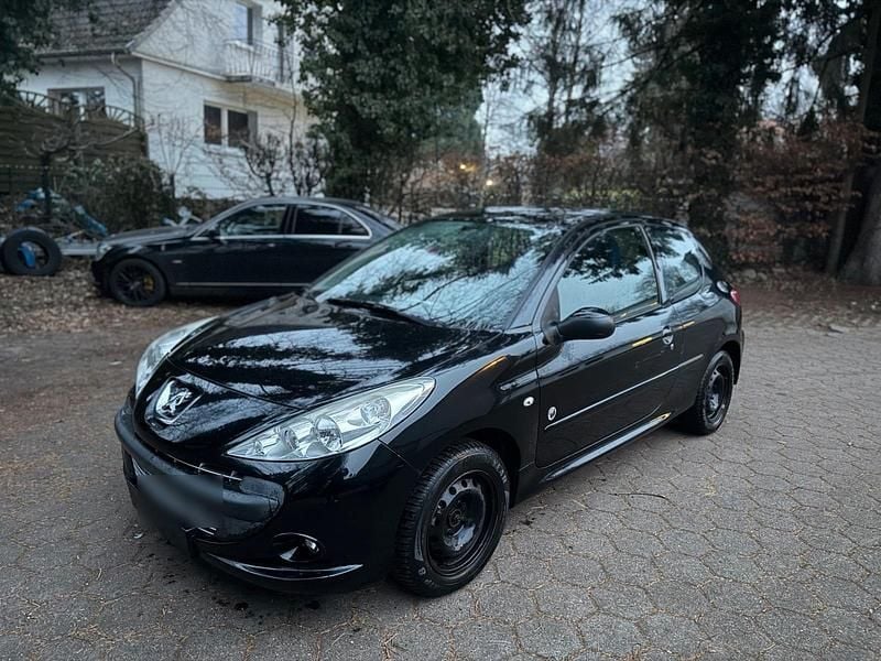 Schwarz Gebraucht 2012 Peugeot 206+ Kleinwagen | 1.500 € - Bild 1/4