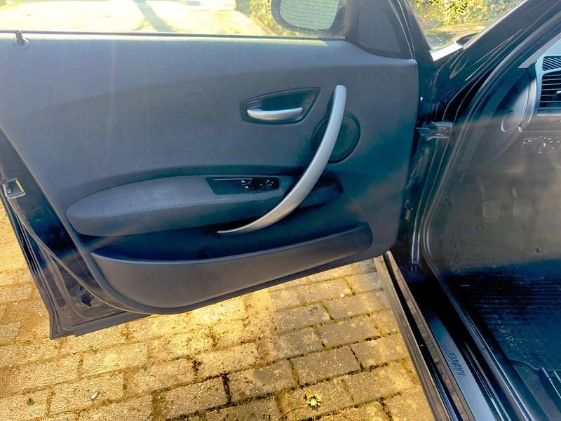 Second-hand BMW 116 Performance 122 CP (89 kW) 2006 Negru Hatchback