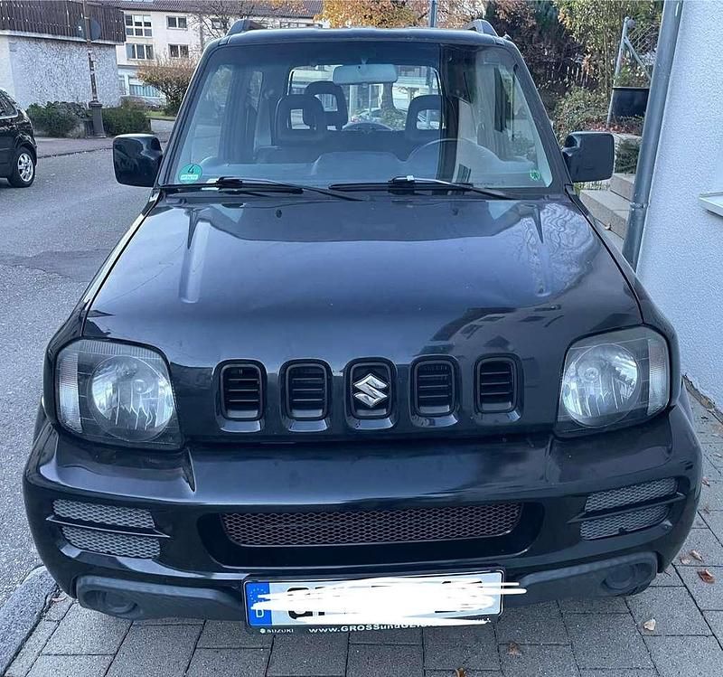Schwarz Gebraucht 2012 Suzuki Jimny Club SUV | 12.900 € (Etwas zu teuer) - Bild 1/4