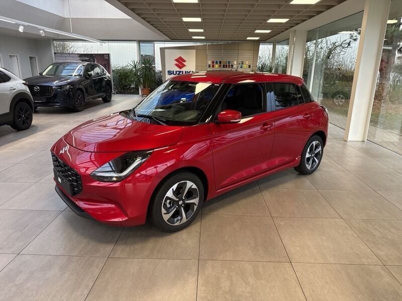 Burning red pearl Gebraucht 2024 Suzuki Swift Comfort+ Kleinwagen | 17.771 € (Fairer Preis) - Bild 1/4