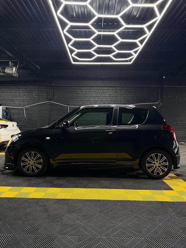 Gebraucht Suzuki Swift 92 PS (67 kW) 2010 Schwarz Kleinwagen