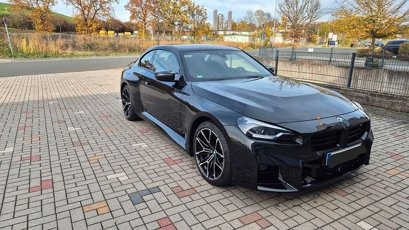 Schwarz Gebraucht 2024 BMW M2 Performance Coupé | 58.500 € (Superpreis) - Bild 1/4
