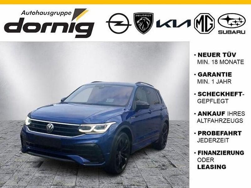 Blau metallic (metallic) Gebraucht 2023 VW Tiguan R-line SUV | 38.895 € (Fairer Preis) - Bild 1/3