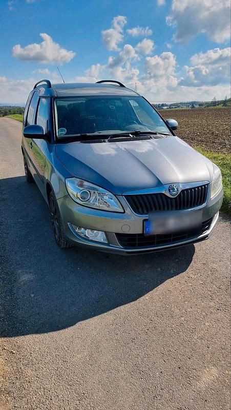 Silber Gebraucht 2012 Skoda Roomster Kombi | 3.999 € - Bild 1/4