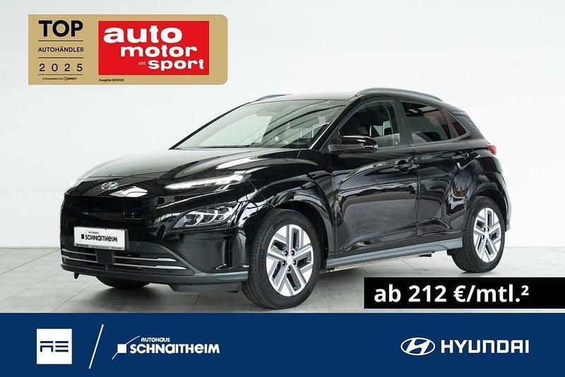 Atlas white (saw) Gebraucht 2022 Hyundai Kona Prime SUV | 25.990 € (Teuer) - Bild 1/4