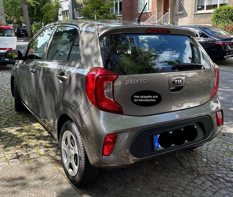 Grau Gebraucht 2019 Kia Picanto Edition 7 Kleinwagen | 7.900 € (Fairer Preis) - Bild 1/3