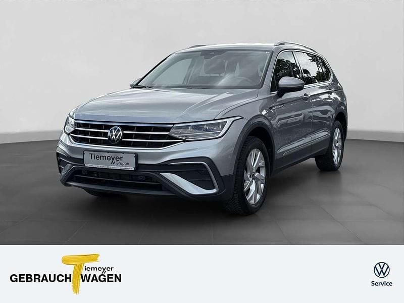 Silber Gebraucht 2024 VW Tiguan Allspace Life SUV | 33.980 € (Superpreis) - Bild 1/4