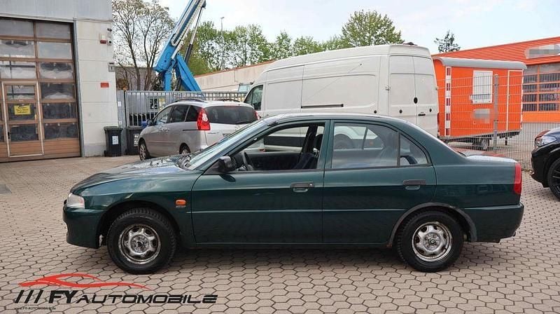 Second-hand Mitsubishi Lancer 75 CP (55 kW) 1998 Verde Berlinǎ