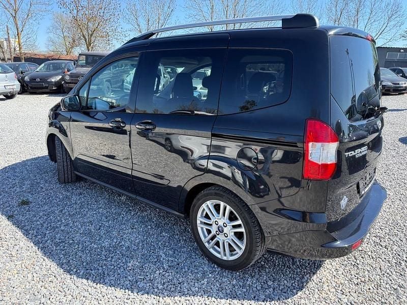 Gebraucht Ford Tourneo Courier Titanium 101 PS (74 kW) 2015 Blau Van / Kleinbus