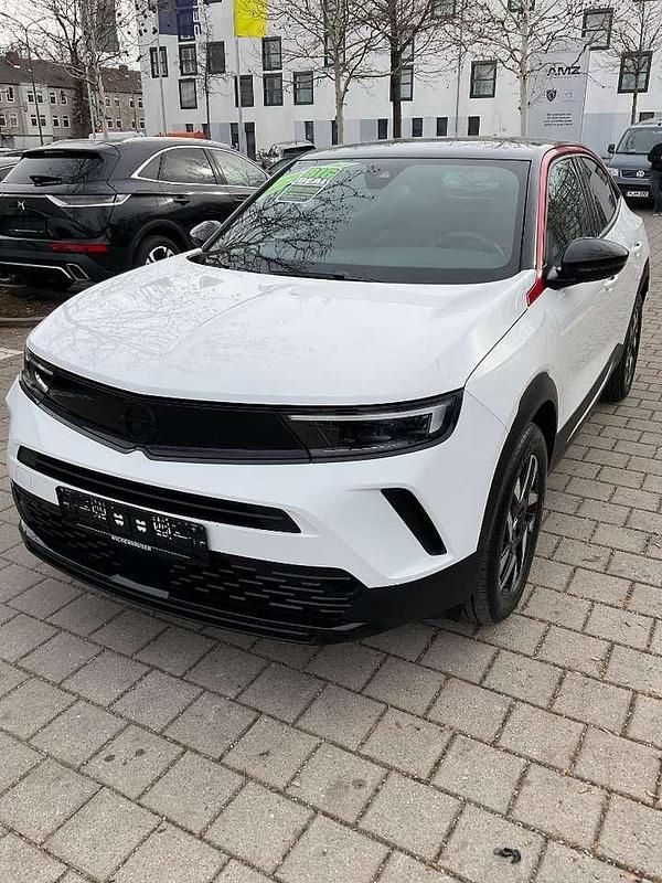 Gebraucht Opel Mokka GS Line 101 PS (74 kW) 2023 Lack weiss banquise/typ aussen SUV