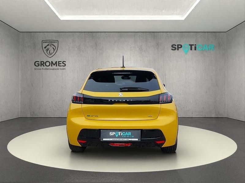 Gebraucht Peugeot e-208 GT 100 kW (136 PS) 2023 Gelb faro (metallic) Kleinwagen