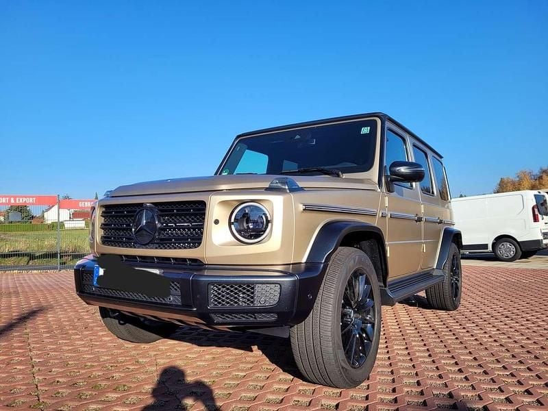 Manufaktur kalaharigold magno Gebraucht 2024 Mercedes G400 AMG SUV | 154.999 € - Bild 1/4