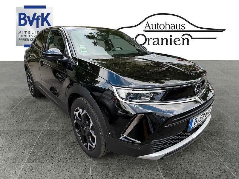 Diamond black (metallic) Gebraucht 2021 Opel Mokka Ultimate SUV | 19.890 € (Fairer Preis) - Bild 1/4