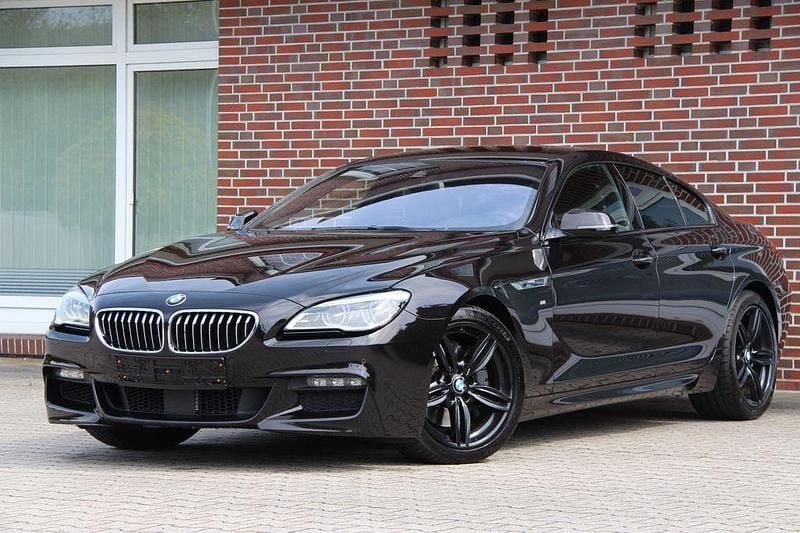 Rubinschwarz metallic Gebraucht 2017 BMW 640 M Sport Coupé | 26.900 € (Superpreis) - Bild 1/4
