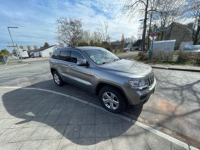 Grau Gebraucht 2012 Jeep Grand Cherokee Limited SUV | 7.500 € (Superpreis) - Bild 1/4