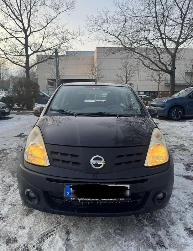 Gebraucht Nissan Pixo 68 PS (50 kW) 2011 Schwarz Kleinwagen