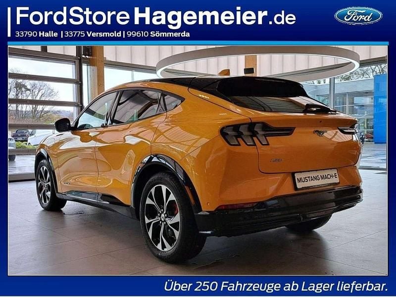 Gebraucht Ford Mustang Mach-E 197 kW (269 PS) 2023 Cyber orange metallic SUV