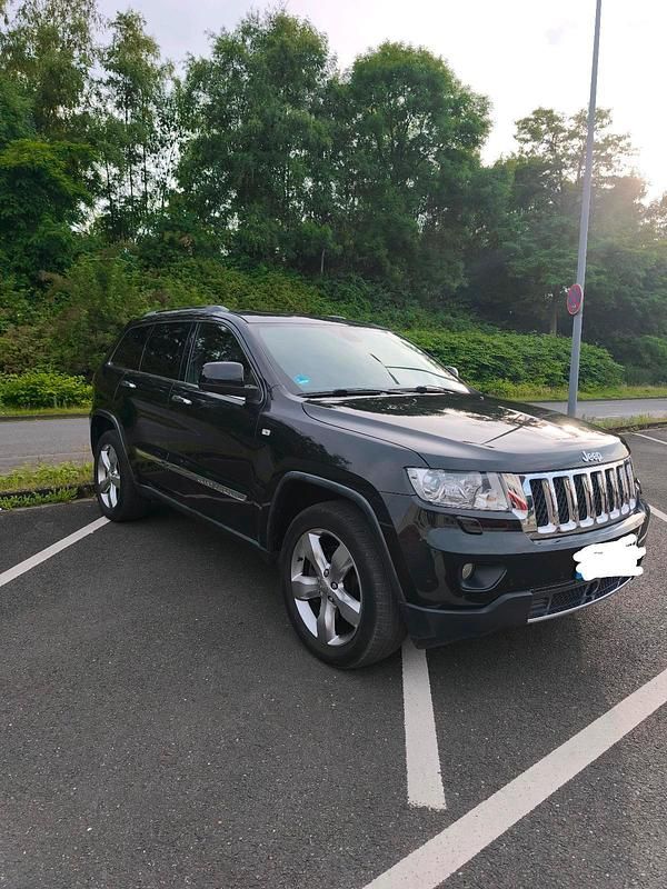 Schwarz Gebraucht 2012 Jeep Grand Cherokee Overland SUV | 10.990 € (Guter Preis) - Bild 1/4