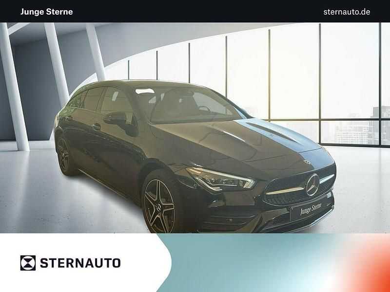 Metalliclack kosmosschwarz Gebraucht 2021 Mercedes CLA250e Shooting Brake AMG line Kombi | 27.370 € (Fairer Preis) - Bild 1/4
