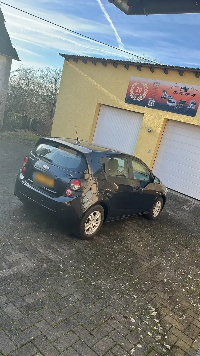 Gebraucht Chevrolet Aveo 101 PS (74 kW) 2013 Schwarz Kleinwagen